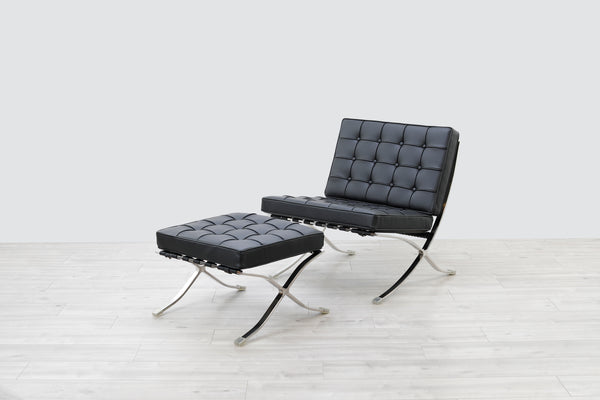 Black leather chair and ottoman